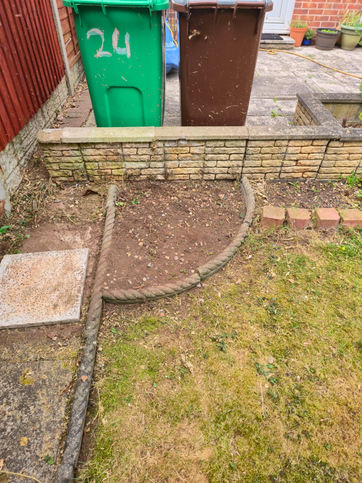 After bush removal - clean cleared garden space ready for landscaping